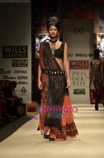 Model walks the ramp for Niki Mahajan show on Wills Lifestyle India Fashion Week 2011-Day 4 in Delhi on 9th April 2011 (127).JPG